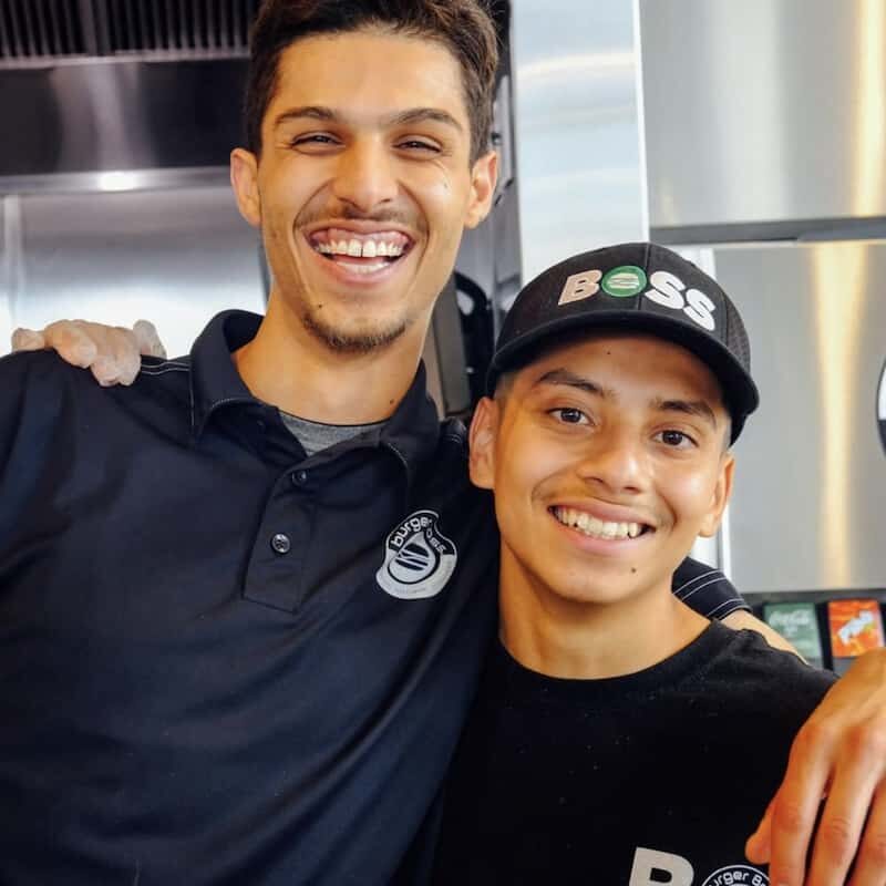 Two of the Burger Boss Team members