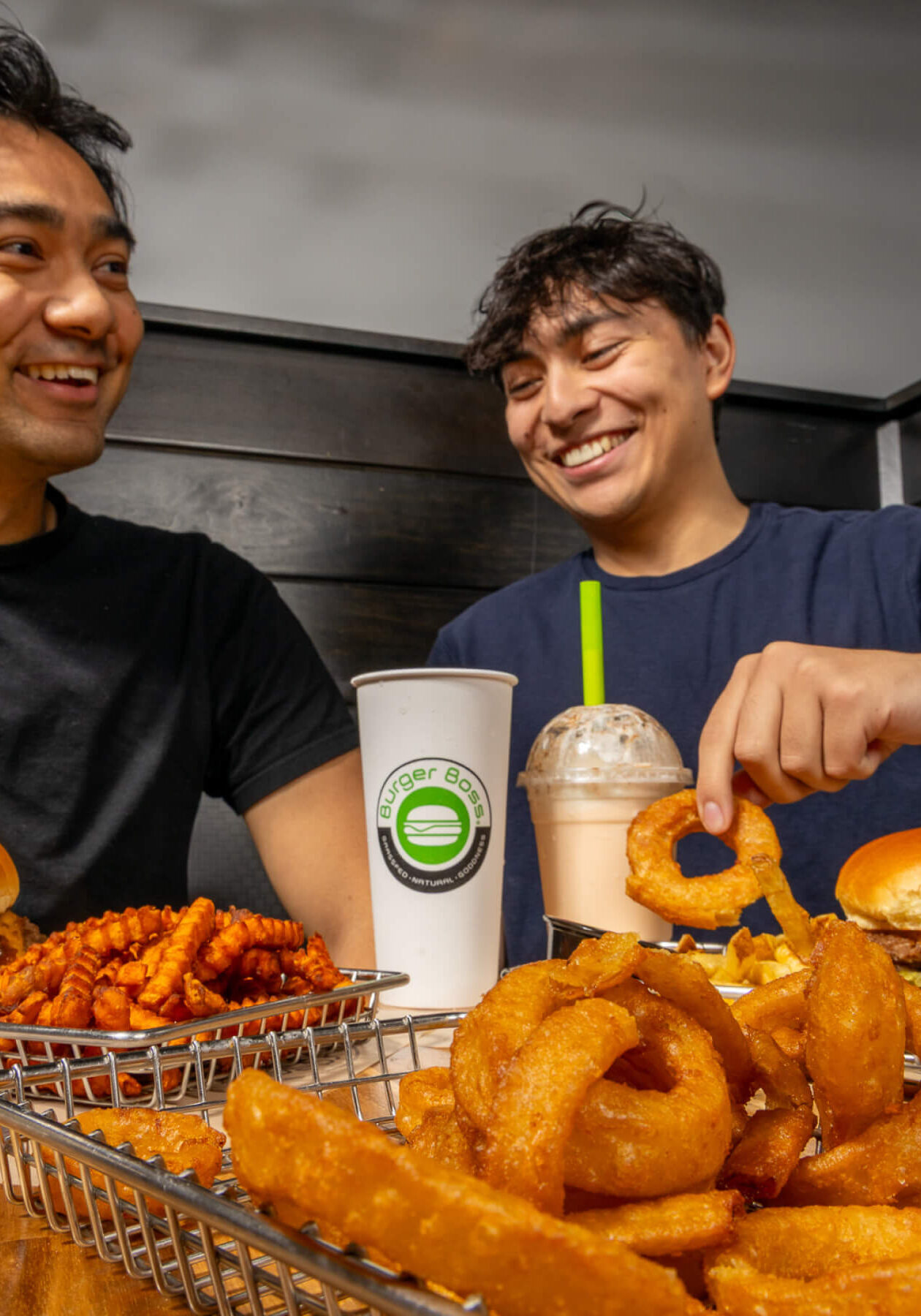 Enjoying grass fed burgers and onion rings